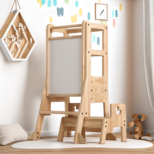 July Forest Montessori tower designed to help toddlers in the kitchen, featuring a built-in chalkboard art easel.