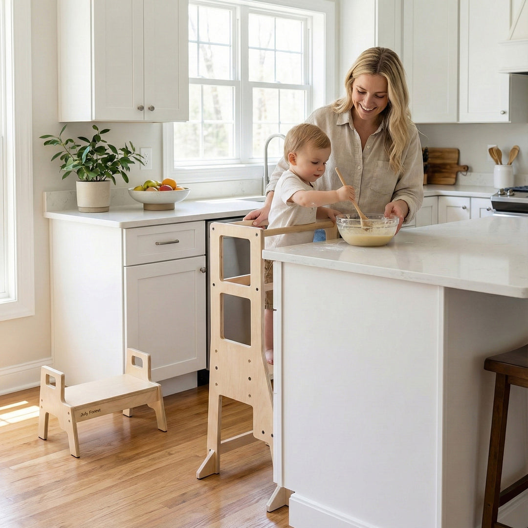 July Forest Montessori tower designed to **help** kids reach the **kitchen** counter safely. Solid wood adjustable step stool with built-in chalkboard.